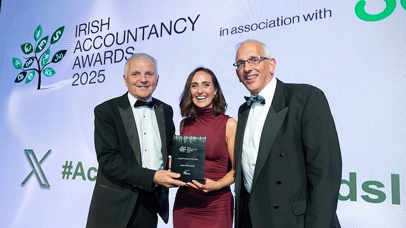 Brendan Howard, managing director, Mercia Ireland, presents the large practice of the year award to Frank Walsh and Sinead O'Connor, Walsh O'Brien Harnett