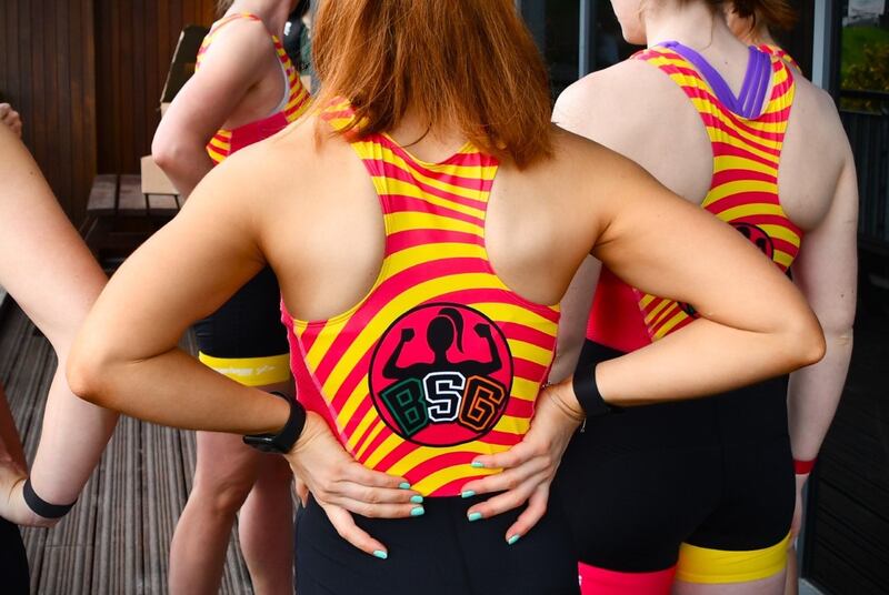 The Big Strong Gorls logo, worn by PR2 para-rowing world champion Katie O’Brien.