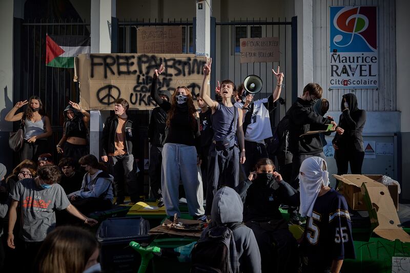French students block the entrance to Maurice-Ravel School in Paris as part of the nationwide day of protests on Thursday. Photograph: Kiran Ridley/Getty Images