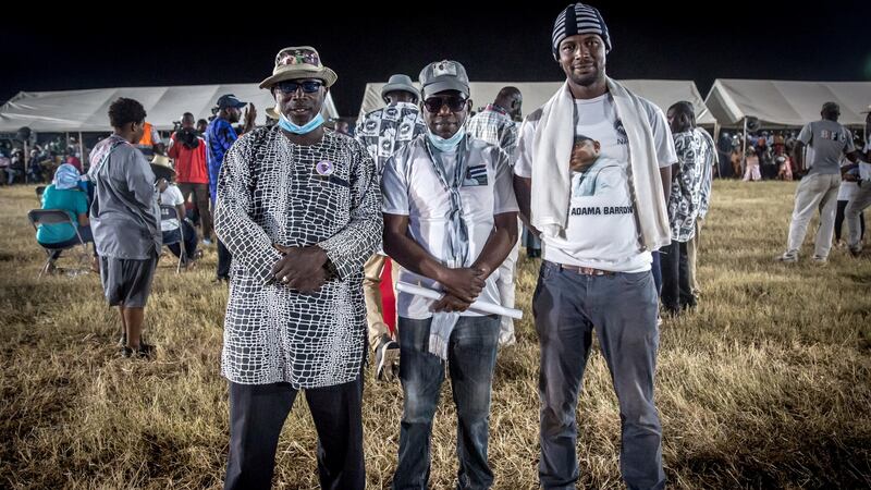 Youth leader Matala Leigh, right, says Adama Barrow should stay in power for three terms. “The people have rights now; they never had rights before.” Photograph: Sally Hayden