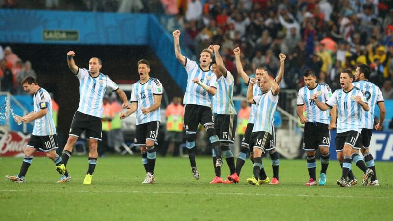 Argentina’s players celebrate  during the penalty shootout against the Netherlands  at the  Corinthians Arena in Sao Paulo. Photograph: Srdhan Suki / EPA