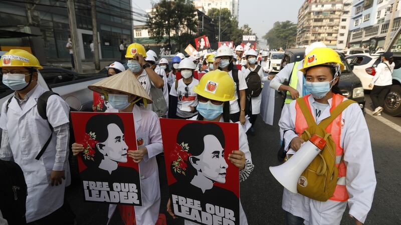Medical staff hold placards calling for the release of detained civilian leader Aung San Suu Kyi during a protest against the military coup, in Yangon, Myanmar. Photograph: Nyein Chan Naing/EPA