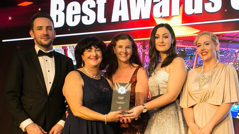 Dagan Fleming, Sales Manager, Stage & Lighting presents the Best In-House Event Team award to, Croke Park Meetings & Events Team.