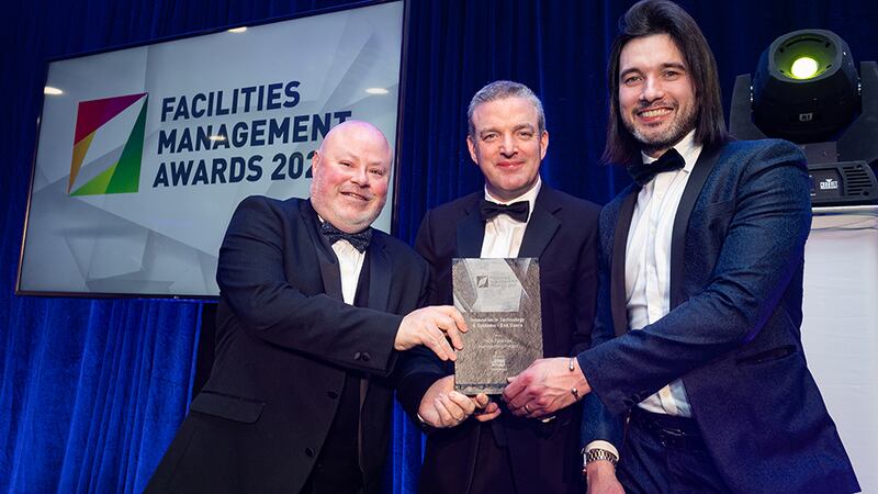 David Norton, Key account Manager, Tork, presents the Innovation in Technology & Systems - End Users Award to Gavin Annon & Jonathan Mallon, MCG Facilities Management Ireland.