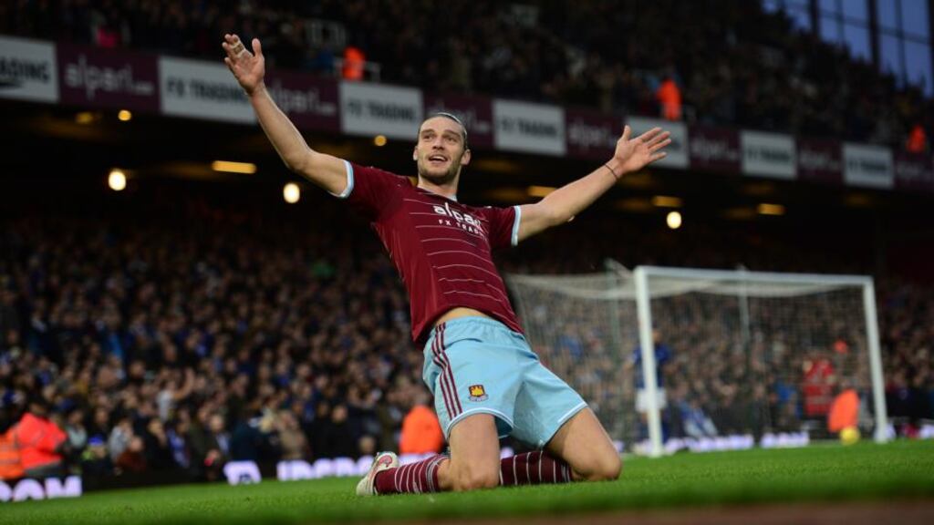 West Ham’s Andy Carroll  celebrates scoring in the  Premier League match against  Leicester City at the Boleyn Ground. Photograph: Jamie McDonald/Getty Images