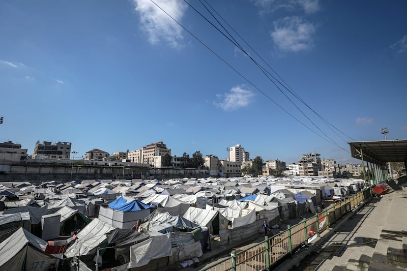 Tents of internally displaced Palestinians set up in Al Yarmouk stadium in central Gaza City in May 2025. Photograph: EPA
