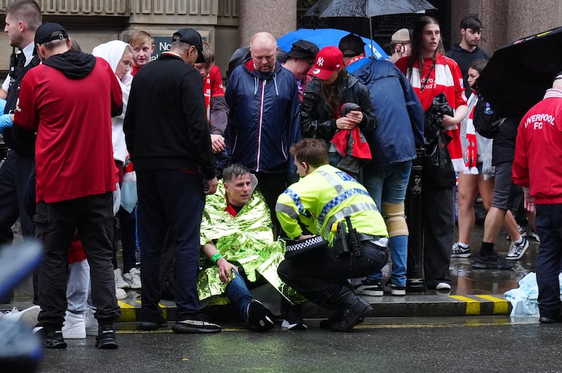 Liverpool parade: Police and emergency personnel manage the incident on Water Street. Photograph: Owen Humphreys/PA