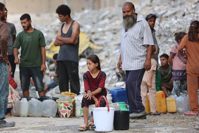Displaced Palestinians collect water at the Qatari-built Hamad City residential complex in Khan Yunis, in the southern Gaza Strip, on September 24th. Photograph: Omar Al-Qattaa/AFP via Getty Images
