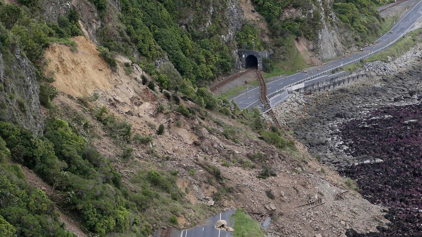 A landslide blocks State Highway One and the main railway line north of Kaikoura following an earthquake in New Zealand. Photograph: Mark Mitchell/New Zealand Herald/Pool via AP