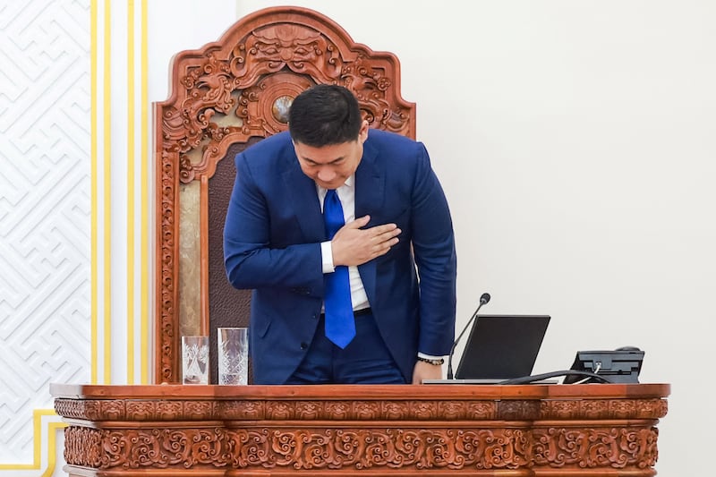 Mongolia's then prime minister Luvsannamsrain Oyun-Erdene bows after losing his position in a vote on June 3rd. Photograph: Byambasuren Byamba-Ochir/AFP via Getty Images        