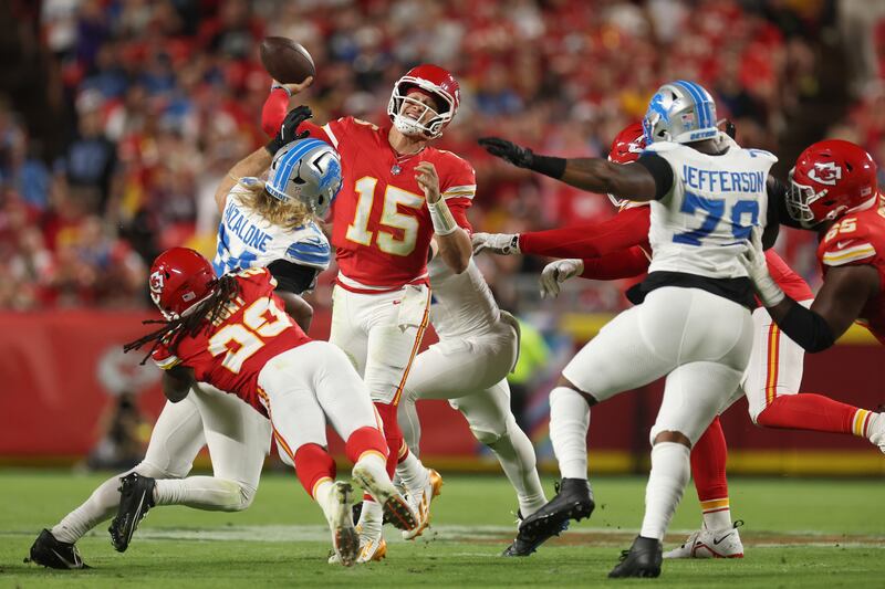 Kansas City Chiefs quarterback Patrick Mahomes passes the ball under pressure from Alex Anzalone of the Detroit Lions during the second quarter in the game at Arrowhead Stadium. Photograph: Jamie Squire/Getty Images