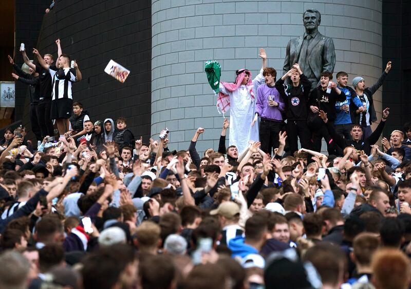 Newcastle United fans celebrate at St James' Park following the announcement that the Saudi-led takeover of Newcastle in May 2022. Photograph: Owen Humphreys/PA Wire