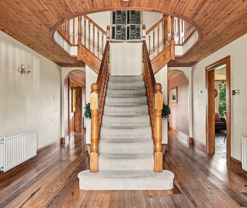 The twin flight staircase in Jeffrey and Eleanor Donaldson's home in Dromore, Co Down. Photograph: PropertyPal