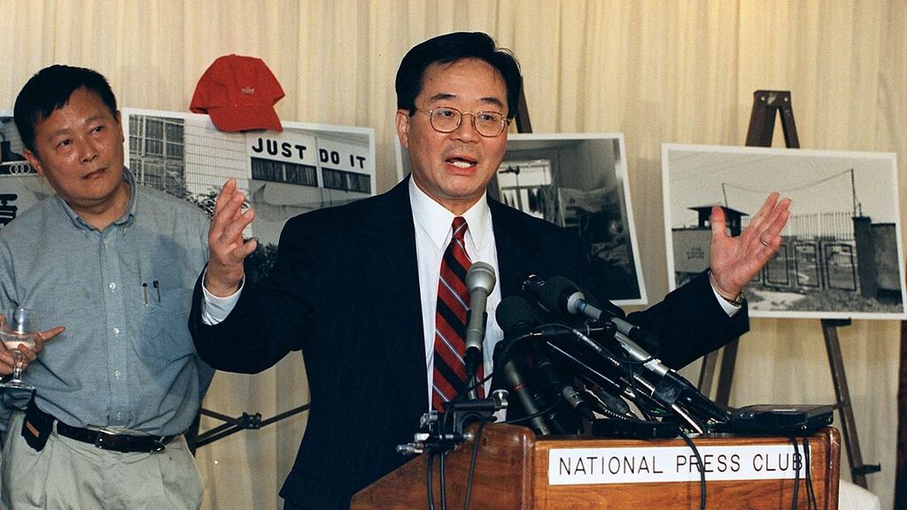 Chinese dissident Harry Wu speaking to reporters during a human rights news conference at the National Press Club in Washington, DC. File photo from 2000: AFP/Getty Images