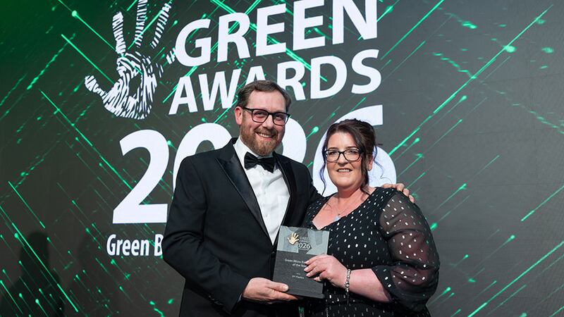 Daragh Anglim, awards judging coordinator, presents the green micro enterprise of the year award to Sharon Barrington, IFF Plastics