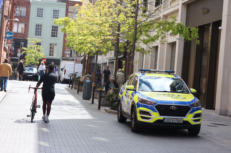 Gardaí remained on Clarendon Street in Dublin on Tuesday morning following the fatal stabbing. Photograph: Stephen Collins/Collins