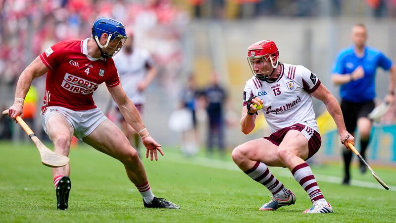 Galway's Conor Whelan in action against Cork's Seán O'Donoghue. Photograph: James Lawlor/Inpho