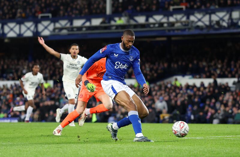 Beto scores Everton's opening goal against Peterborough. Photograph: Carl Recine/Getty Images