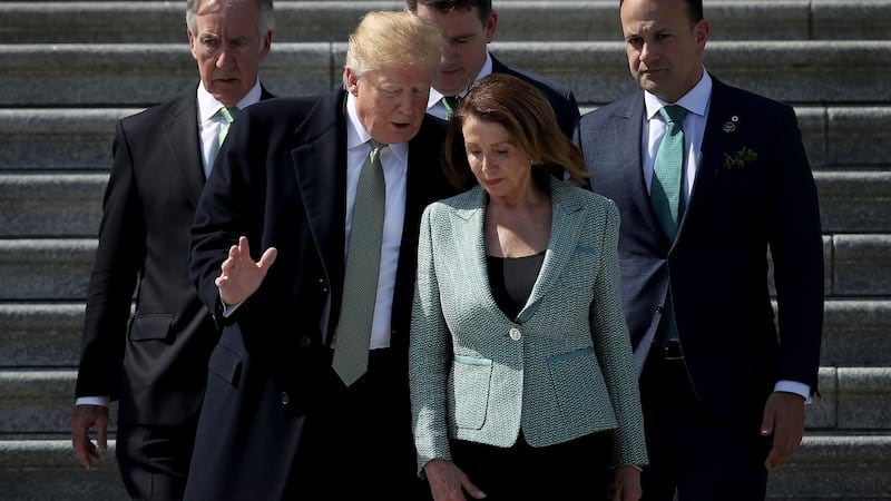 US president Donald Trump confers with Speaker of the House Nancy Pelosi, after St Patrick’s Day celebration on March 14, 2019 with  Richard Neal  and Taoiseach Leo Varadkar. Photograph: Win McNamee/Getty