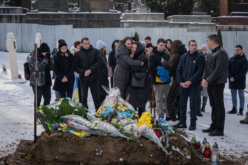 People attend the funeral in Lviv of Ukrainian soldiers Bogdan Baran, Mihajlo Popic and Vitaly Fedor on February 9th. Photograph: Adri Salido/Anadolu Agency via Getty Images