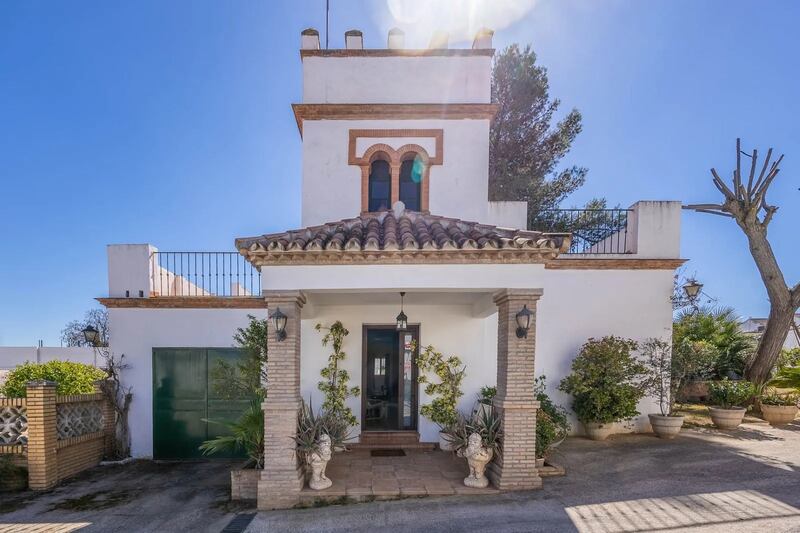 Spain: Seville: Extending to 150sq m, there is also a garage and a large swimming pool with shaded terraces