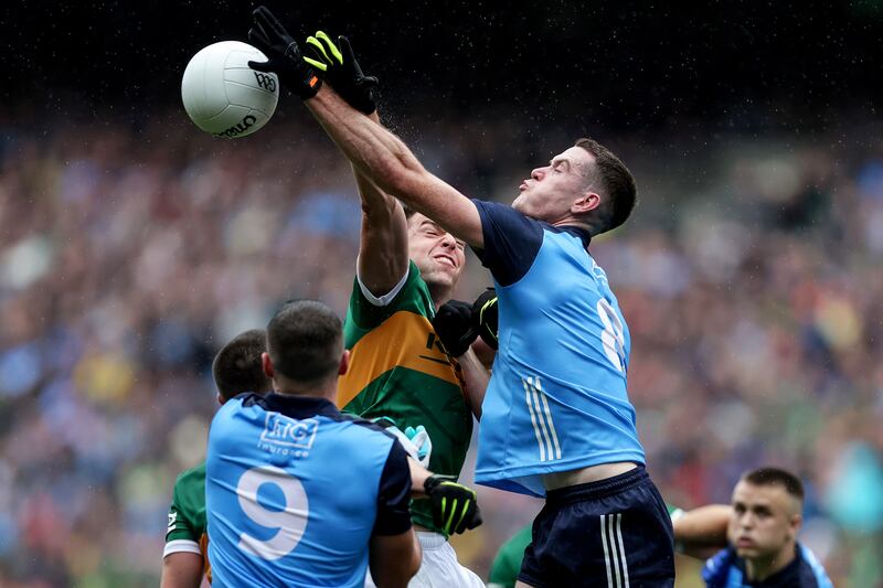 Kerry's Jack Barry and Brian Fenton of Dublin battle for possession. Photograph: Laszlo Geczo/Inpho
