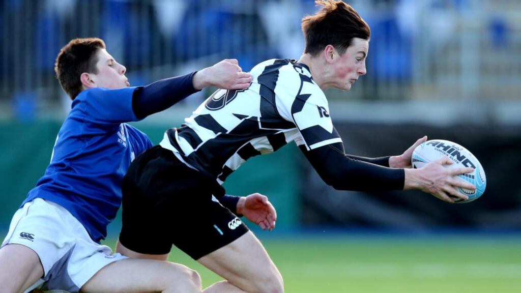 Roscrea centre Jay Culliton scores a try. Photograph: Ryan Byrne/INPHO