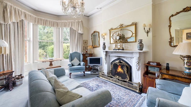 Livingroom with bay window looking over the back garden