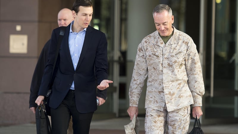 Jared Kushner speaking with General Joseph Dunford, chairman of the joint chiefs of staff, in Germany en route to Baghdad on Monday. Photograph: Dominique A Pineiro/AFP/Getty Images