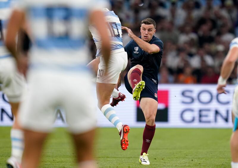 Argentina's Santiago Carreras (left) runs into England's George Ford, for which the Argentina player received a yellow card. Photograph:  Andrew Matthews/PA Wire. 