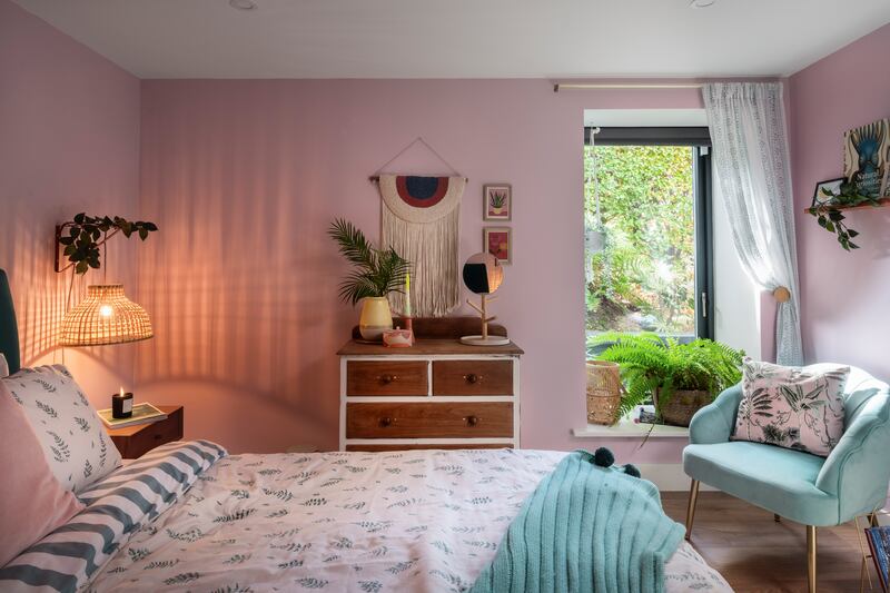 Bedroom featuring calming pink and green palette