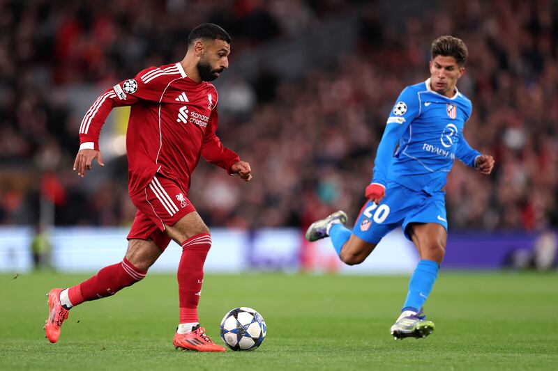 LIVERPOOL, ENGLAND - SEPTEMBER 17: Mohamed Salah of Liverpool runs with the ball during the UEFA Champions League 2025/26 League Phase MD1 match between Liverpool FC and Atletico de Madrid at Anfield on September 17, 2025 in Liverpool, England. (Photo by Ryan Pierse/Getty Images)