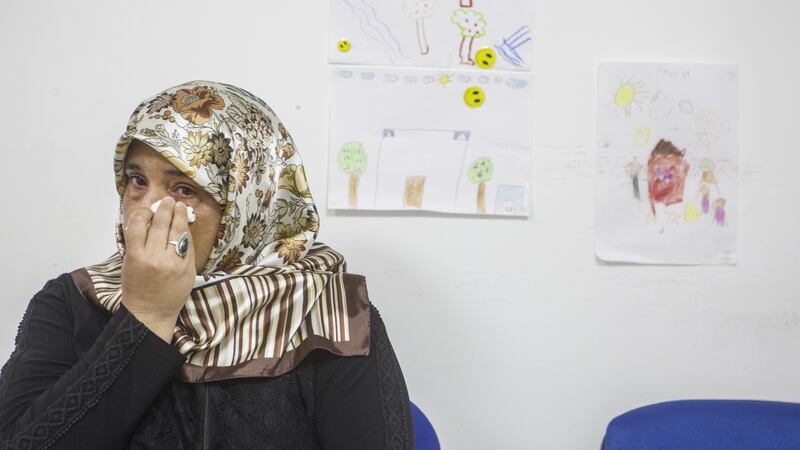 Amena Hassan from Aleppo wants to go to Europe or Canada where her son Hajji can get better medical treatment. Photograph: European Commission/Eren Aytu