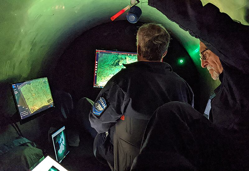 OceanGate Expeditions staff at work inside the now lost submersible vessel Titan. Photograph: OceanGate Expeditions/PA Wire