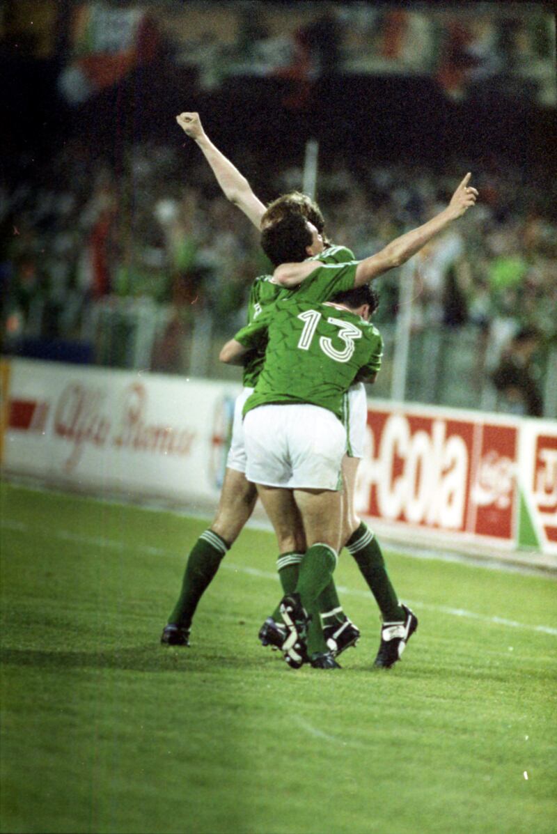 Andy Townsend, Kevin Sheehy and Steve Staunton celebrate a goal against England during Italia 90. Photograph: Peter Thursfield 