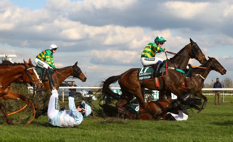 Peter Carberry riding Gabbys Cross falls off during the Randox Grand National Chase during day three of the festival at Aintree Racecourse in 2023. Photograph: Michael Steele/Getty Images