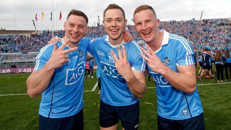 Dublin’s Philly McMahon, Dean Rock and Ciarán Kilkenny celebrate the three-in-a-row of All-Ireland titles after the victory over Mayo at Croke Park in September.   Photograph: James Crombie/Inpho