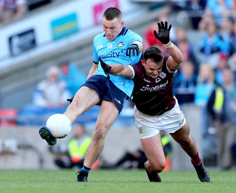 Galway’s Cillian McDaid puts pressure on Con O’Callaghan as he attempts a late point to level the game. Photograph: James Crombie/Inpho