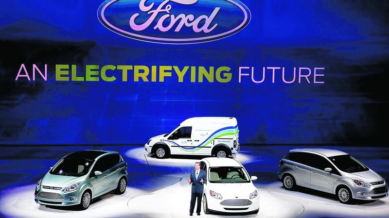 Bill Ford  with some of the car maker’s electric and hybrid vehicles. Photograph: Andrew Harrer/Bloomberg