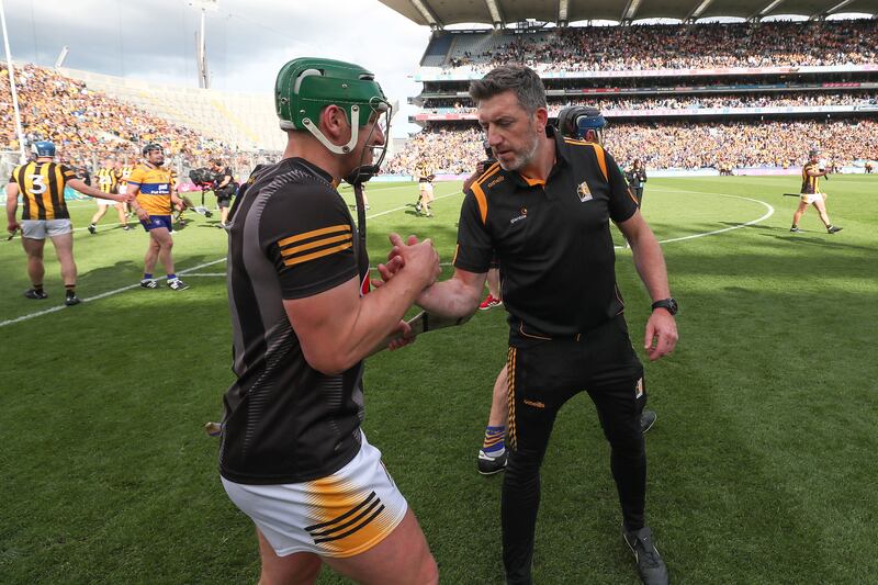 Eoin Murphy is congratulated by his manager, Derek Lyng, after the final whistle. Photograph: Bryan Keane/Inpho