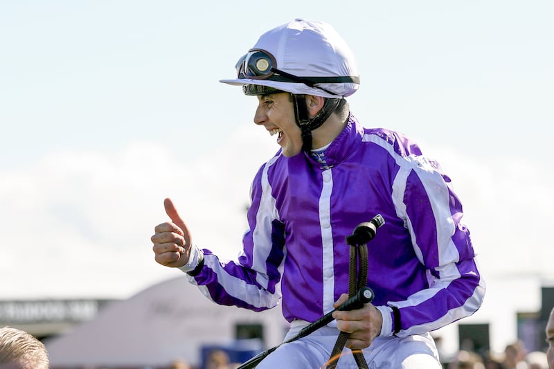 Ronan Whelan onboard Precise celebrates winning the Moyglare Stud Stakes at the Curragh Racecourse. Photograph: Laszlo Geczo/Inpho