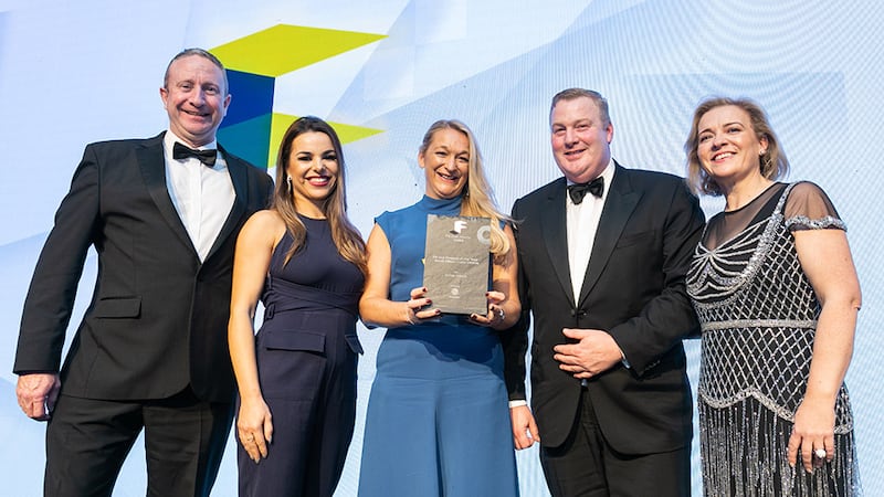David Burke, managing director, Globoserv, presents the Fit Out Project of the Year - Small Office under €500K award to TODD Architects team.