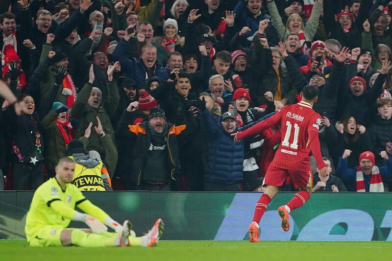 Mohamed Salah celebrates scoring Liverpool's first goal. Photograph: Peter Byrne/PA
