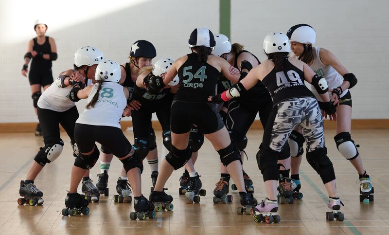 Members of the Team Ireland roller derby squad in training at Inchicore Community Sports Centre, Dublin. Photograph: Bryan O’Brien