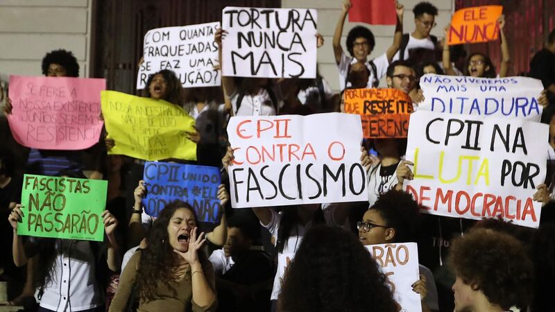 Hundreds of Brazilians, mostly students, demonstrated in several cities in the country against the elected president, the far-right Jair Bolsonaro, and demanded that he respect democracy during his term. Photograph: Marcelo Sayao/EPA