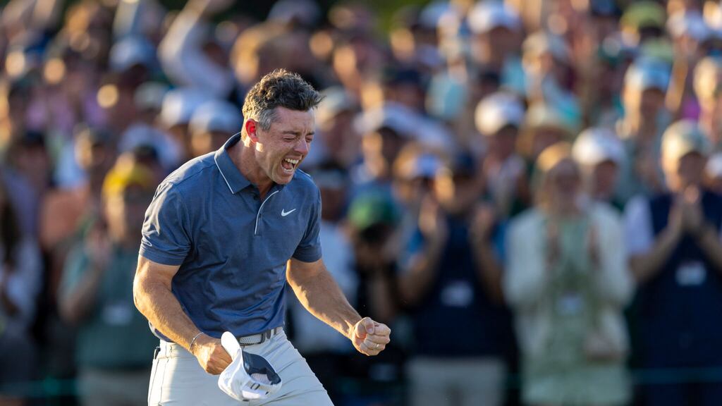 Rory McIlroy celebrates winning the Masters after beating Justin Rose in a playoff, seeing him complete the career grand slam. Photograph: Kieran Cleeves/Augusta National/Getty Images