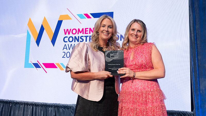 Emma Maye, awards judge, presents the business owner of the year award to Clíona Molloy, McKeon Group and Hereworks