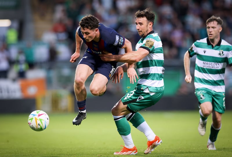 St Patrick's Athletic's Kian Leavy is challenged by Enda Stevens of Rovers. Photograph: Tom Maher/Inpho