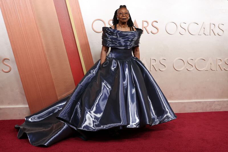 Whoopi Goldberg wears a shimmering metallic-look dress by Christian Siriano. Photograph: David Swanson/EPA