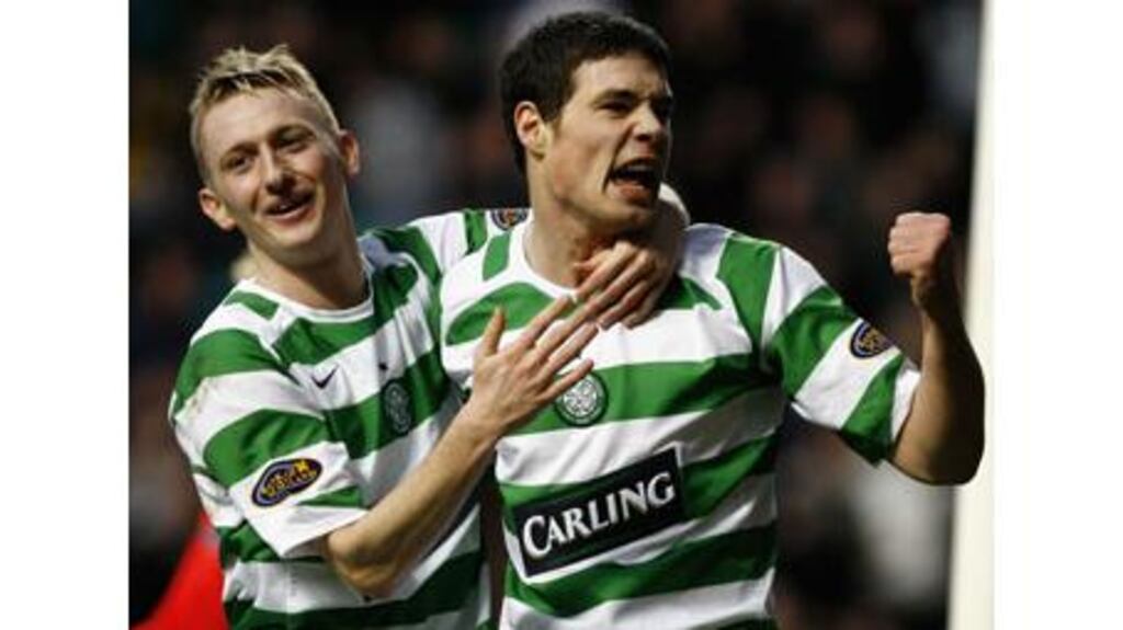 Celtic's Darren O'Dea (right) has signed a new contract with the
club